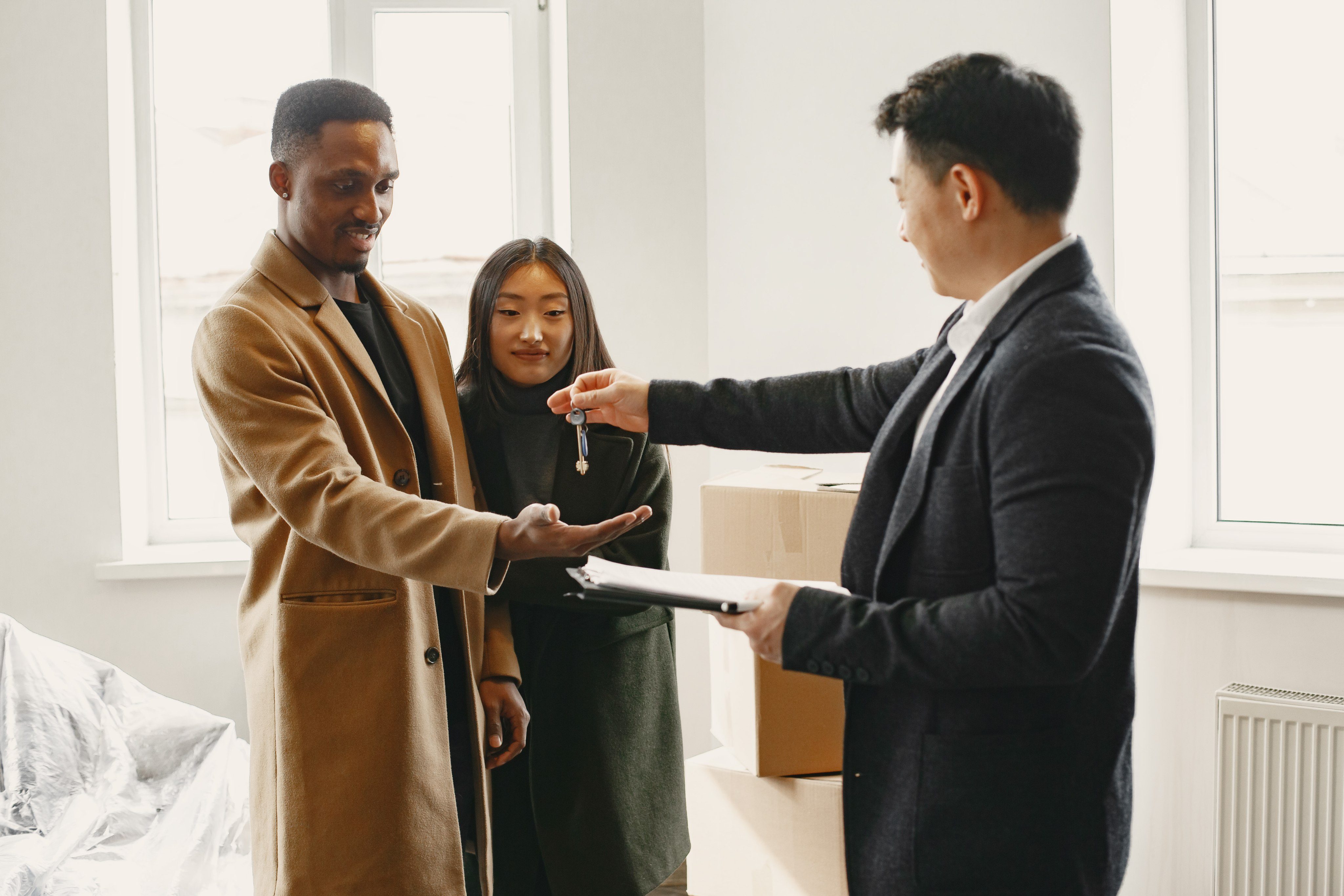 Landlords receiving keys for a rental property