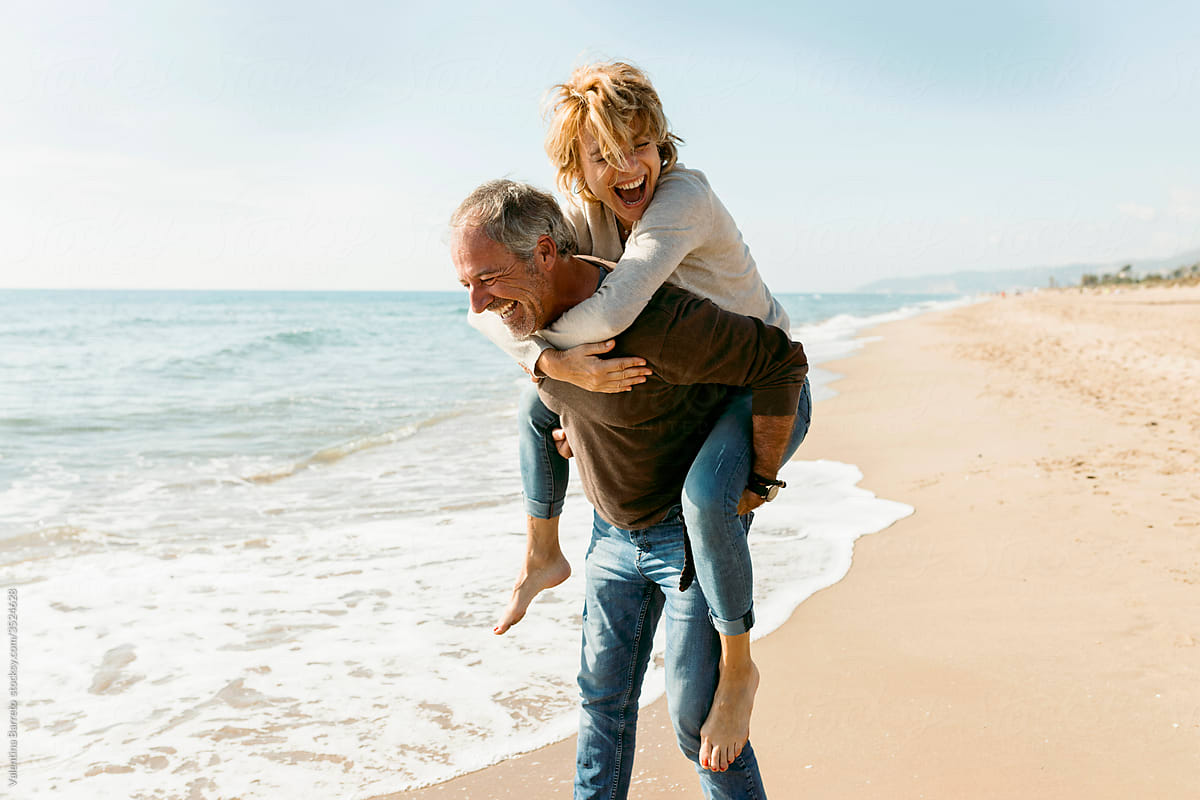 Older couple by the beach